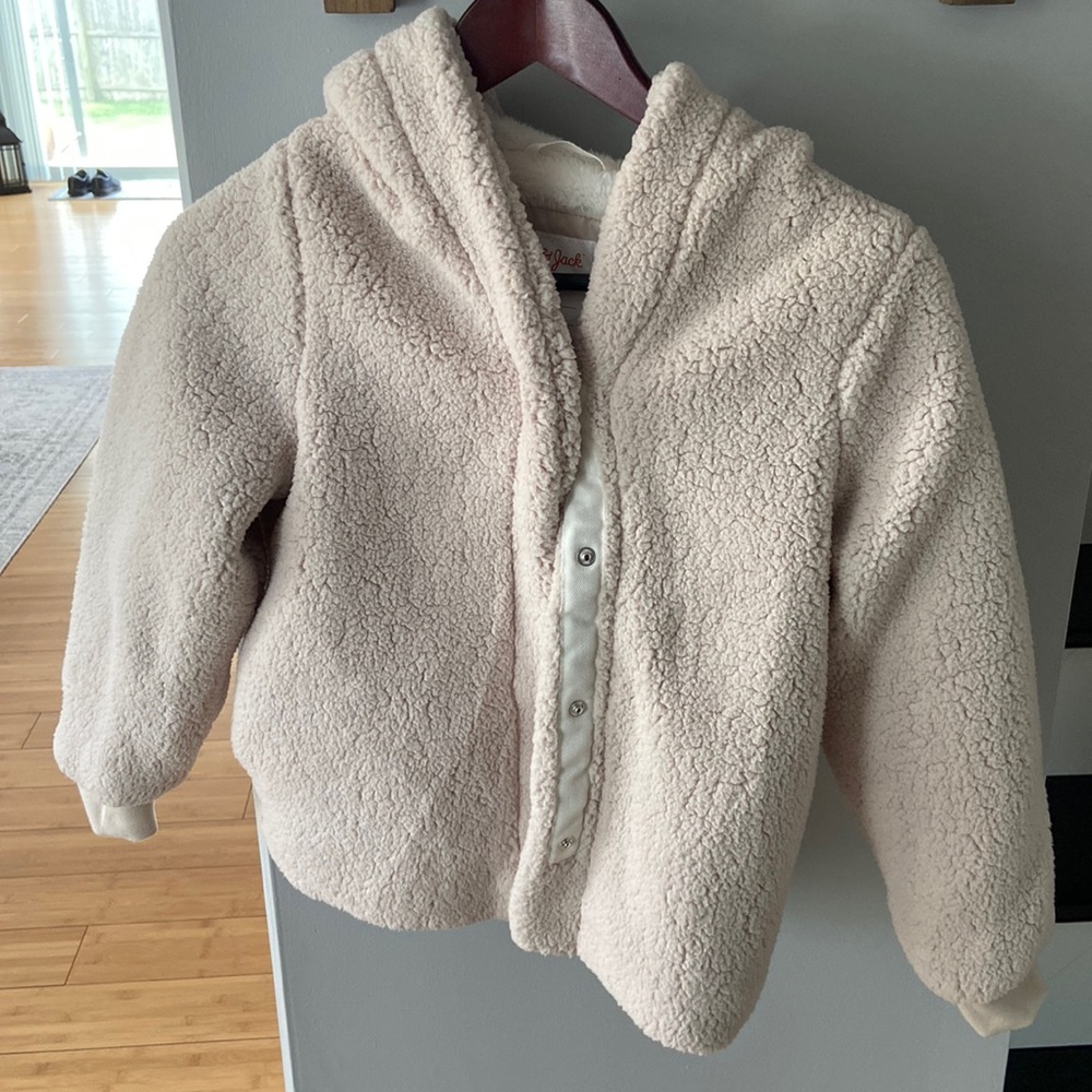 Brand new never worn size 7/8, fleece with hood